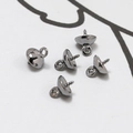 Macro shot of 5 gun black plated bead caps with threaded pins for pearl jewelry making - Large Round Gun Black