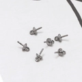 Macro-opname van gunmetal grijze parelcup hangers voor DIY sieraden maken accessoires - Medium Rond Gunmetal Zwart