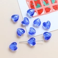 Détail d'une perle cœur en verre bleu avec texture feuille d'argent et tige métallique - 16# Bleu Royal