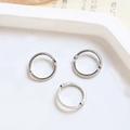Macro shot of silver scalloped metal bead rings for DIY jewelry on a white tray - White Gold Suitable for 10mm Bead (TB678982327984)