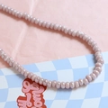 Detail of lavender macaron ceramic beads with soft pearlescent luster for DIY jewelry - Light Purple (7#)