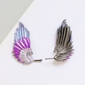 Close-up of gold-plated wing earrings with purple and blue gradient enamel details - Gun Black