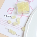 Détail des perles barils translucides jaune clair de 6x9mm pour la création de bijoux - Perle Tonneau (5# Jaune Laiteux) / 6x9mm / Jaune Crème
