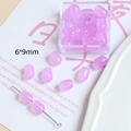Détail de perles de verre violettes 6x9mm pour création de bijoux et bracelets - Violet