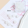 Détail de perles en verre macaron blanc translucide de 8 mm pour bijoux DIY - Blanc Rond