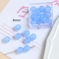 Détail de perles rondes bleu clair translucides de 8mm pour bijoux DIY avec boîte - Bleu Rond