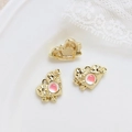 Detail of colorful heart planet pendant with gold alloy base and honeycomb back texture - Gold Heart