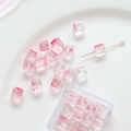 Macro shot of pink gradient glass cube beads with through-holes for DIY jewelry making - 20 Pieces Pack / 2# Peach Pink