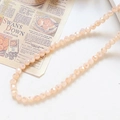 Detailed macro view of faceted champagne glass beads for DIY jewelry making and craft design - 100个装/条 / Champagne (2#)
