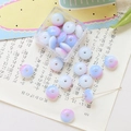 Detailed view of pink and blue gradient glass beads for DIY jewelry making and crafts - 10 Pieces Pack / Blue and Purple
