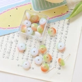 Detailed view of light orange and green gradient handmade glass beads for jewelry DIY - 10 Pieces Pack / Orange Green