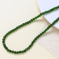 Primo piano di perline sfaccettate in vetro smeraldo per creazione di gioielli DIY e collane - Filo Singolo (circa 100 pezzi) / Verde Scuro (20#)