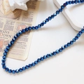 Dettaglio di perle sfaccettate blu intenso con lustro metallico per creazione gioielli - 100 Pezzi/Confezione / Blu Reale (18#)