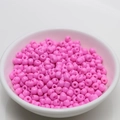 Macro view of 4mm pink seed beads for DIY jewelry making in a white bowl - 4mm / Barbie Pink