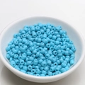 Close-up of 4mm sky blue matte beads in a white ceramic bowl for DIY jewelry making - 4mm / Sky Blue