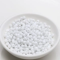 Macro detail of 4mm white glossy beads in a ceramic bowl for DIY jewelry making - 4mm / White