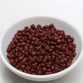 Macro shot of 4mm polished dark brown beads in a white bowl for DIY jewelry making - 4mm / Dark Coffee