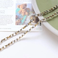 Detail of vintage gold rings and crystal beads chain on an aesthetic magazine background - Clear White