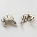 Macro shot of silver-plated flowing fox tail charms for DIY pearl jewelry making - Nine-tailed Fox Tail Style / White Gold