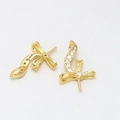 Detail view of gold-plated ribbon bow jewelry accessories with sparkling zircon stones - Rhinestone Inlaid Clasp / Gold