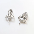 Macro shot of silver hollow leaf jewelry charms with white zircon stone setting - 8# Crown Rhinestone Silver