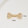 Détail macro du fermoir OT léopard plaqué or avec zircons et dimension de 33 mm de large - Style Couronne (18#)
