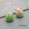Detail shot of cute pink pig plush figure in green watermelon base, size 29x38mm - Watermelon Pig (D2082)