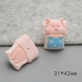 Close-up of pink flocked cartoon pig charm showing front and back DIY details - Sleeping Pig (D2082)