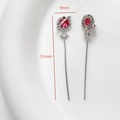 Silver drop earrings with red round stone in saturn design and hanging octagonal star - White Gold