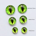 Detailed comparison of green glass dragon eye cabochons in 6mm, 8mm, and 10mm sizes - Small / Bionic Cat Eye Style (27#)