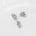 Macro detail of three silver drop earrings with petal hollow design and white zircon inlays - Petal Hollow Craft Teardrop Style (09#)