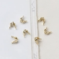 Close-up of 14K gold plated C-shape jewelry clasps for DIY necklace making - 14K Gold Tone Double-End Calotte