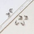 Detailed view of silver-plated U-shaped fold-over crimp bead covers for jewelry making - Silver White Bead Tips Calottes