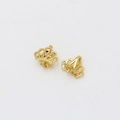 Macro detail of gold-plated crown pendant with zircon stones for DIY jewelry making - K Gold