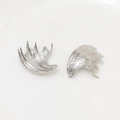 Macro detail of silver-plated dragon wing charms with skeletal texture and metallic finish - 02# White Silver Wings