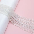 Macro shot of 2mm iridescent white glass seed beads for DIY jewelry making accessories - Transparent Crystal Style