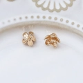 Detailed view of gold-plated flower spacers with intricate zircon accents for DIY jewelry - 3D Blooming Petal Design (Size 16, Price Per Piece)