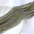 Détail de perles de rocaille en verre bleu irisé et bronze 2mm pour bijoux DIY - Style Iridescent Mélange Jaune Bleu