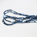 Macro view of blue faceted crystal beads with iridescent coating for DIY jewelry making - Magic Ore Blue