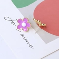 Macro detail of purple flower earrings with gold plating and enamel finish - Deep Purple Flower