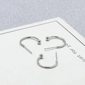 Polished silver C-shaped stud earrings with round bead ends on white card display - 15mm / White Gold