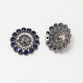 Macro view of gold-plated flower base with blue zircon and hollow filigree design - Gun Black Color Blue Zirconia (6#)