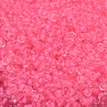 Macro shot of 4mm macaron pink core glass seed beads for DIY jewelry making accessories - Bright Pink