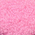 Macro shot of 4mm macaron pink seed beads with cream cores for DIY jewelry making - Light Pink