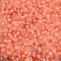 Macro shot of 4mm macaron orange core seed beads for DIY jewelry making and crafts - Dark Pink