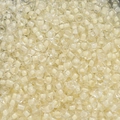 Macro shot of 4mm cream core glass seed beads for DIY jewelry making and craft projects - Light Yellow