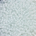Macro shot of 4mm macaron glass seed beads for DIY jewelry and accessory making - White