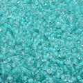 Macro shot of 4mm turquoise macaron glass beads with silver core for DIY jewelry making - Mint Blue