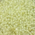 Macro shot of 4mm light yellow translucent glass seed beads for DIY jewelry making crafts - Pale Green