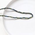 Iridescent Macaron crystal glass rice beads in peacock blue and green for DIY jewelry - Aurora Brown
